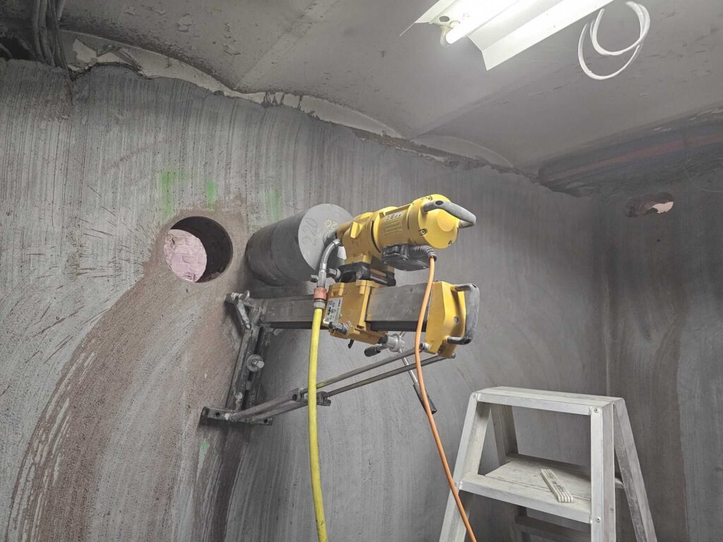 gaten laten boren in beton muur